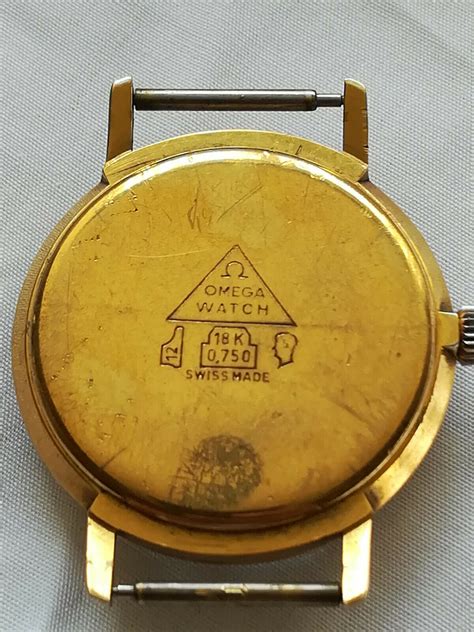 omega 18k 0750 swiss made